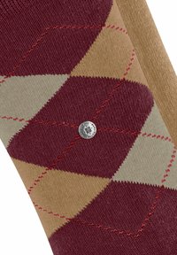 Calza testurizzata che mette in mostra un motivo argyle colorato in bordeaux, beige e verde, con un bottone logo in argento.