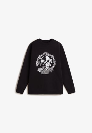 Felpa nera realizzata in cotone con maniche lunghe. Presenta una grafica bianca di un teschio con cuffie e il testo "OFF THE WALL."