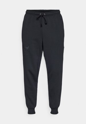Black sweatpants made of soft fabric featuring an elastic waistband with drawstring, tapered legs, and an embossed bull logo on the left thigh.