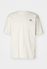 ESSENTIALS - T-shirts - beige
