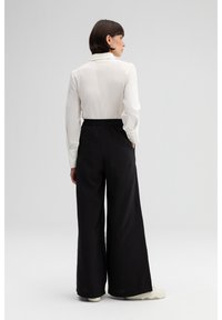 Touché Privé HIGH  WAISTED CUPRA  - Hlače - black