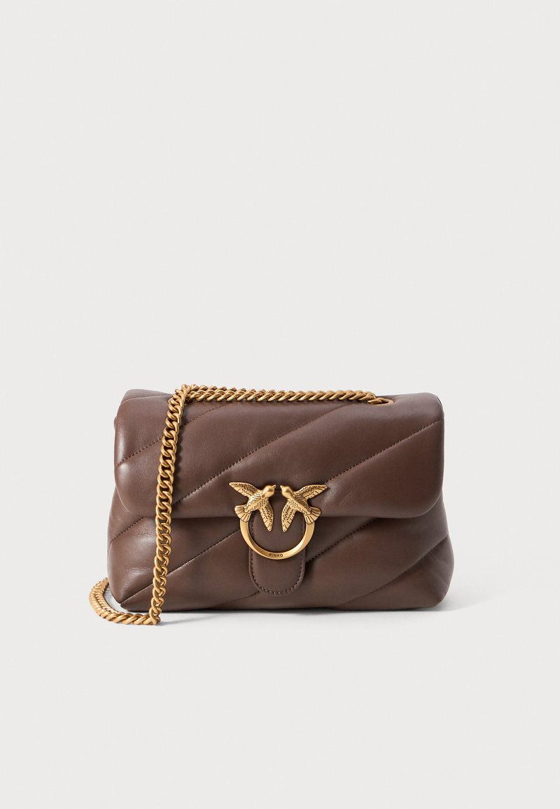Brown leather handbag featuring a quilted design, gold-tone chain strap, and a decorative clasp with two birds. Compact and structured shape.
