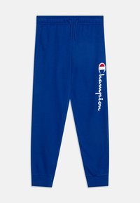 Blue sweatpants made of soft fabric, featuring an elastic waistband, tapered cuffs, and white embroidered "Champion" logo on the side.