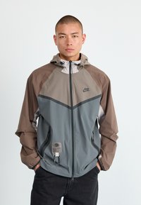Nike Sportswear - TECH WOVEN - Summer jacket - cave stone/college grey Thumbnail Image 1