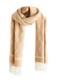 Peach woven scarf with white diamond pattern and fringed ends. Soft texture, lightweight design, suitable for layering and warmth.