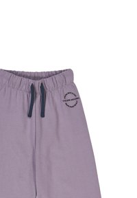 Lila Sweatpants aus weichem Stoff, mit elastischem Bund, Kordelzug und einem runden bedruckten Detail mit Text an der Seite.