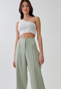 TUSSAH FREDA  - Hlače - sage green