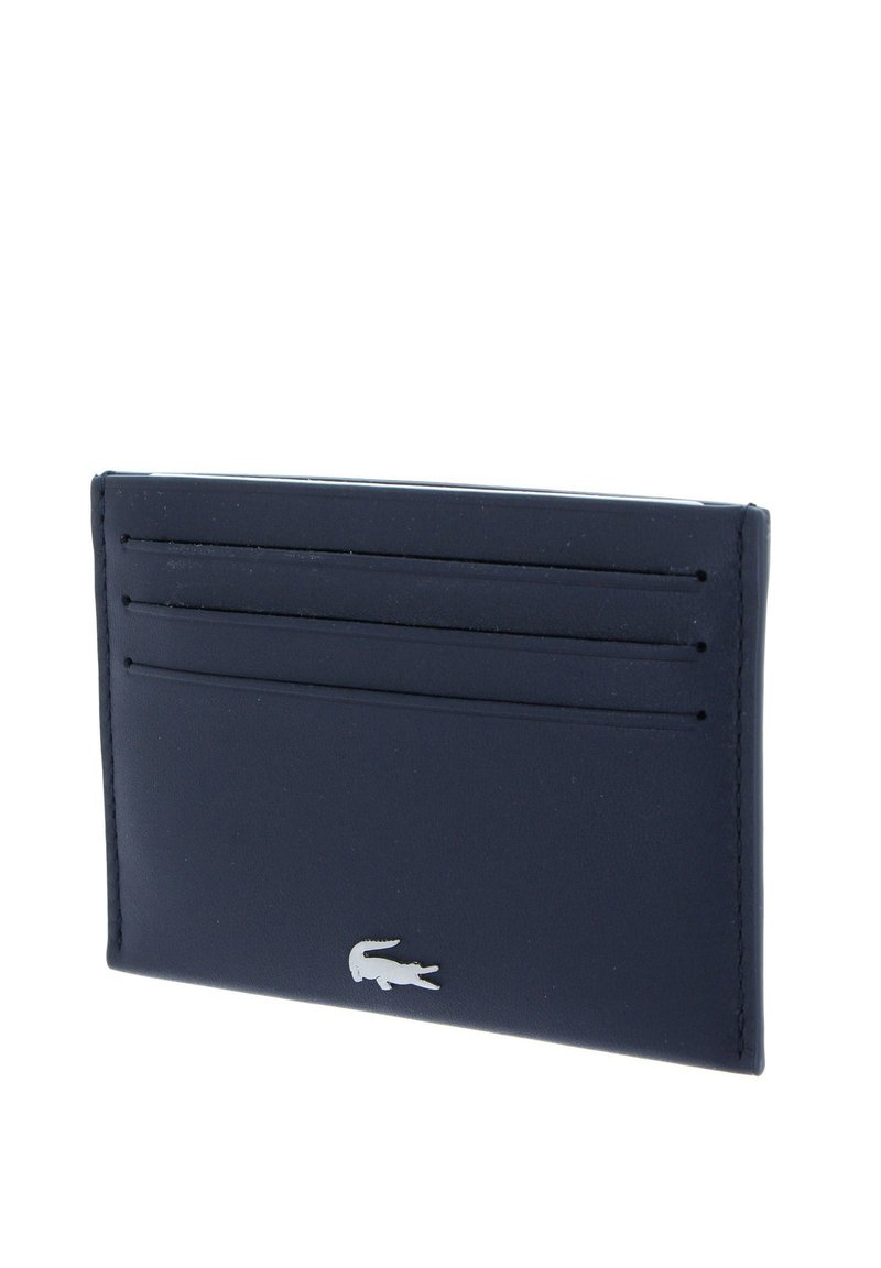 Portofel din piele bleumarin cu multiple sloturi pentru carduri, design elegant, având un mic accent cu logo argintiu pe o parte. Textură netedă.