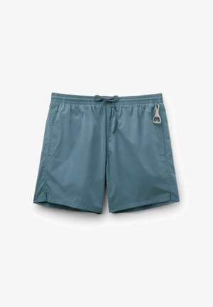 Men’s teal swim shorts with elastic waistband, drawstring, side pockets, and a metal bottle opener attached to right pocket.
