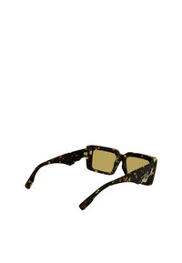 Tortoiseshell sunglasses with square lenses, yellow-tinted lenses, and a thick frame. Features a gold accent and hinge details.