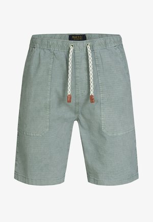 Lysgrønne shorts lavet af tekstureret stof, med en elastisk talje og en dekorativ snor samt to sidelommer.