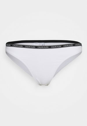 Culotte bianca con fascia elastica nera che presenta il logo "CALVIN KLEIN". Tessuto morbido e elasticizzato, vestibilità standard con copertura minima.