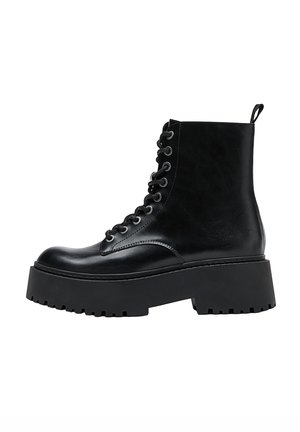 Stivaletti con plateau - black