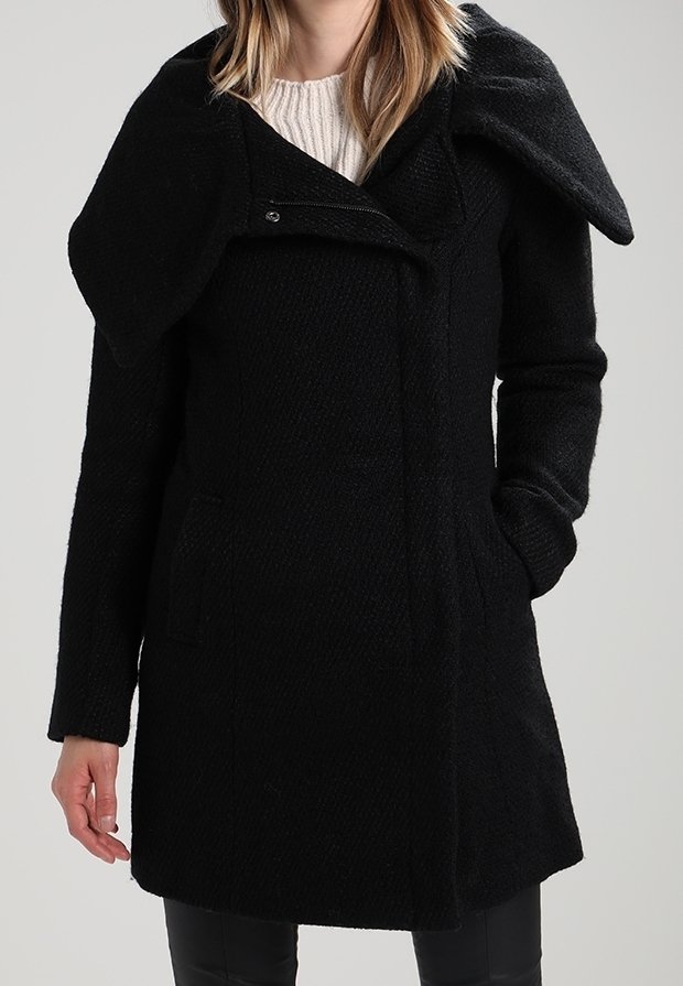 Black wool coat with a textured finish, oversized collar, zip closure, and side pockets. Features a fitted shape and below-hip length.