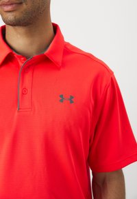 Under Armour Poloshirts - racer red/pitch gray
