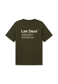 Olive green cotton t-shirt featuring a back print in white with brand name and text details. Short sleeves and relaxed fit.