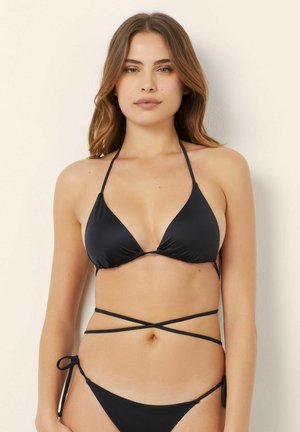 Black bikini set featuring a triangular top with thin straps and a bottom with side ties. Smooth texture, minimalist design, and sleek shape.