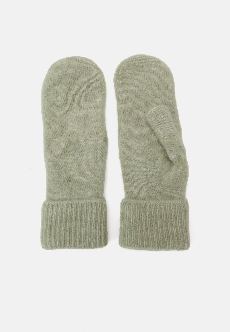 Gröna ullvantar med ribbad mudd. Vantarna har en traditionell form, med en separat tumme för funktionalitet.