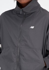 New Balance ATHLETICS JACKET - Summer jacket - blacktop