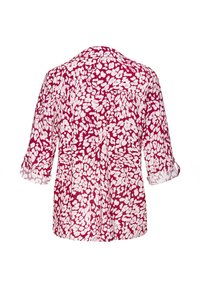 Kurzarmhemd in Fuchsia mit weißem Blumenmuster, mit einem Kragen und umgeschlagenen Ärmelenden, aus leichtem Stoff gefertigt.