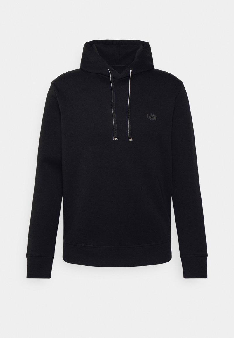 Black hooded sweatshirt made of cotton. Features a front pocket, silver drawstrings, and a small logo on the chest. Classic fit.