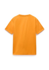 Tricou cu mâneci scurte din bumbac portocalie strălucitor. Textură fină, guler rotund și o croială relaxată cu tiv drept. Fără modele sau grafice.