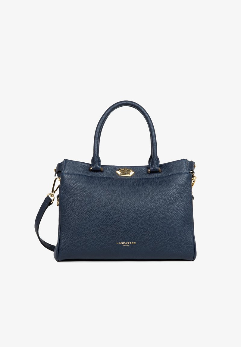 Sac à main en cuir texturé bleu marine avec double poignée, bandoulière amovible et accents de ferrures couleur or.