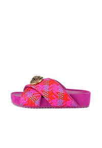 Fuchsia closed-toe sandal with woven red and pink straps and blue accents. Features a decorative gold eye detail on the upper.