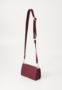 Tommy Hilfiger HER MINI CROSSOVER - Geantă crossbody - deep rouge