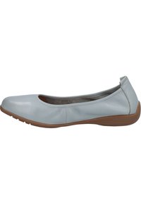 Flat shoe in light blue leather with a rounded toe, subtle seams, and a brown rubber sole. Smooth texture with a minimalist design.