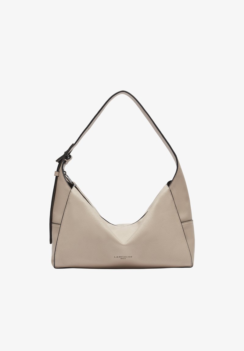 Beige Leder-Schultertasche mit kurvenförmigem Design, kontrastierenden schwarzen Akzenten und einem einzelnen Schulterriemen. Verfügt über eine strukturierte Oberfläche.