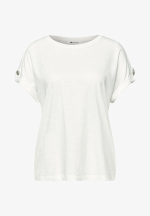 Biała koszula z krótkim rękawem, okrągłym dekoltem, podwiniętymi mankietami zabezpieczonymi patkami na guziki oraz luźnym, swobodnym krojem.