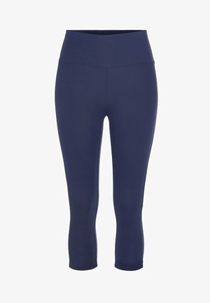 Leggings capri bleu marine en tissu lisse et extensible. Taille haute et design longueur cheville. Pas de coutures ni de motifs visibles.