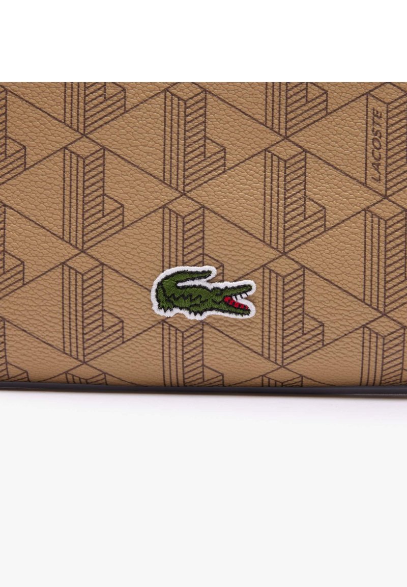 Lacoste Umhängetasche - mono viennois rain drum/beige - Zalando.de 