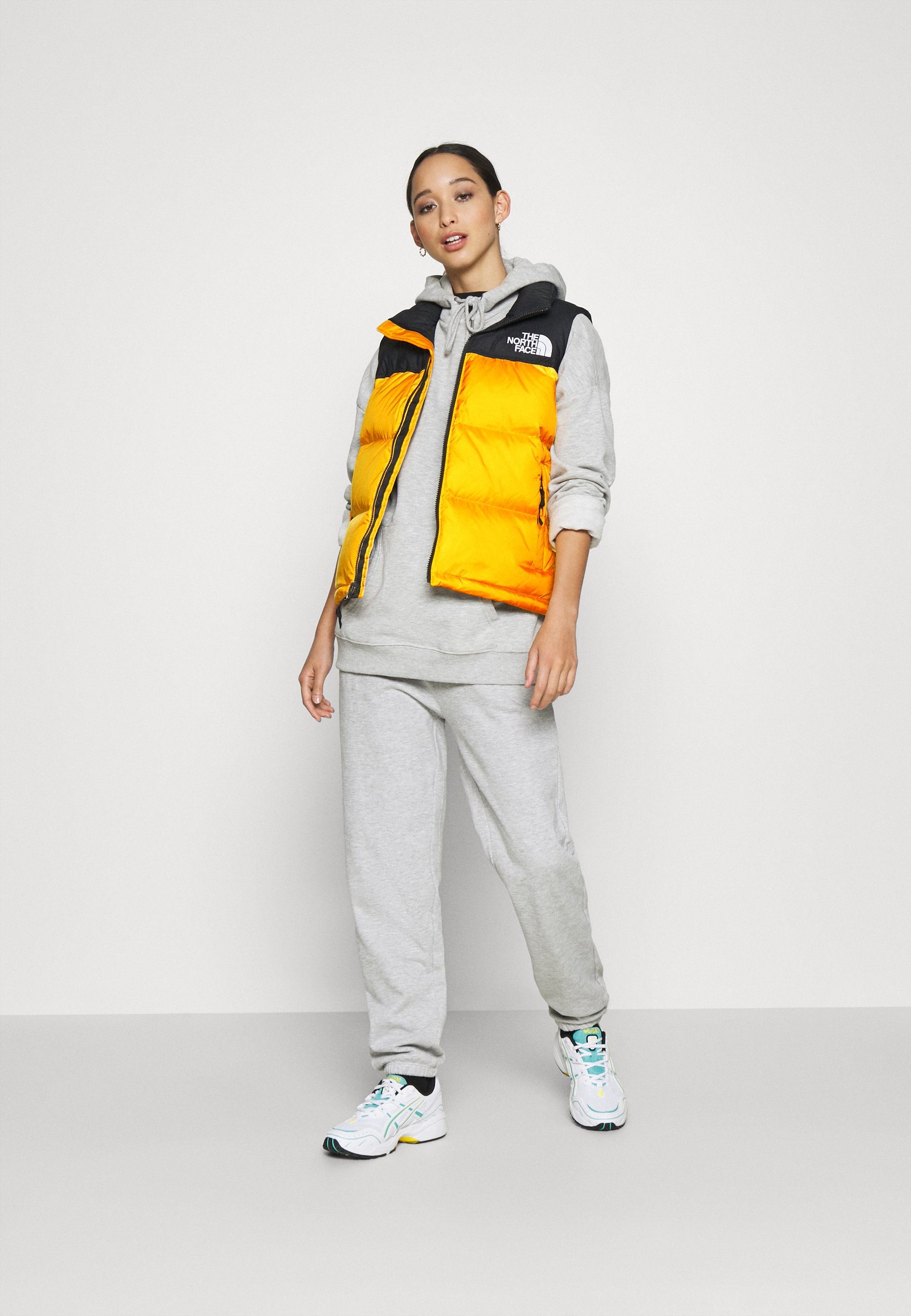 north face gold vest