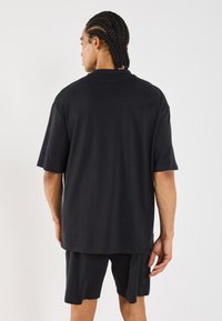 YOURTURN SET UNISEX - Pyžamo - black