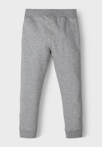 Graue Jogginghose aus weichem Stoff, mit einem breiten elastischen Bund und gerippten Bündchen an den Knöcheln. Keine Muster oder Verzierungen.