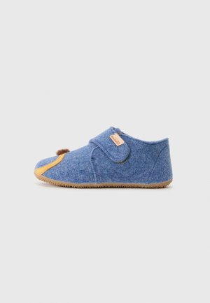 Blue felt slipper with a tan accent, rounded shape, Velcro strap, and a small brown pom-pom detail on the front. Textured rubber sole.