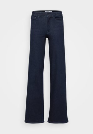 Jean large bleu foncé en denim. Doté d'un design classique à cinq poches, de boutons à l'avant et de coutures droites.