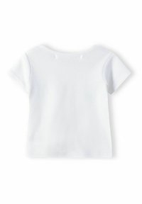 Vit kortärmad T-shirt i mjuk bomull. Rund halsringning med tryckknappar på axlarna, enkel och okomplicerad design med rena kanter.