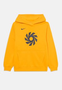 Žltá mikina s kapucňou z mäkkého materiálu, ktorá má predné vrecko, kapucňu so šnúrkou a veľkú námornícku špirálovú grafiku na hrudi. Logo Nike na ramene.