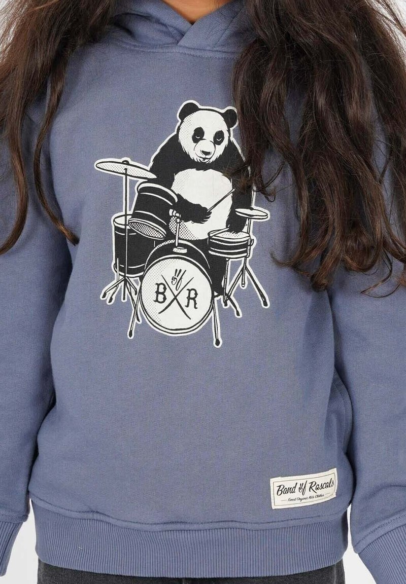 Child wearing a blue hoodie with a black and white panda playing drums printed on the front.