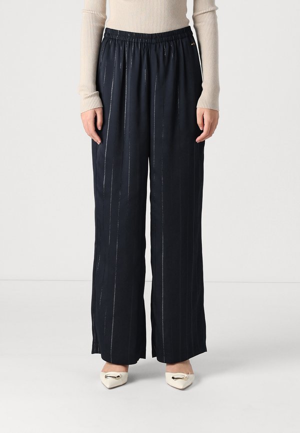 FLUID PANT - Trousers