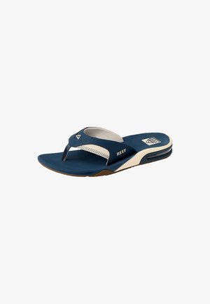Blue and white Reef brand men's flip-flop sandal with cushioned sole and air pocket visible in the heel.