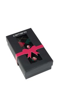 Schwarze Geschenkschachtel mit klarem Fenster, die gemusterte Socken mit grünen und roten Elementen enthält, gesichert mit einem rosa Band und einer Schleife.