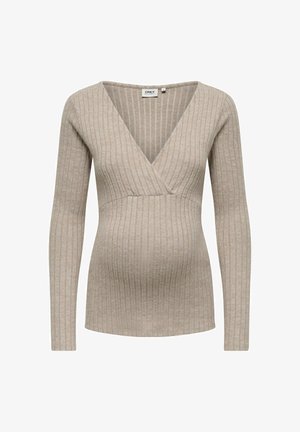 Haut de maternité beige à côtes avec des manches longues et un col en V, présentant une coupe ajustée et une texture douce et extensible.