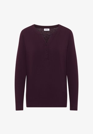 Langarmhemd in donkerpaars met een Henley-kraag, drie knopen en een zachte textuur. Casual ontwerp met een relaxte pasvorm.