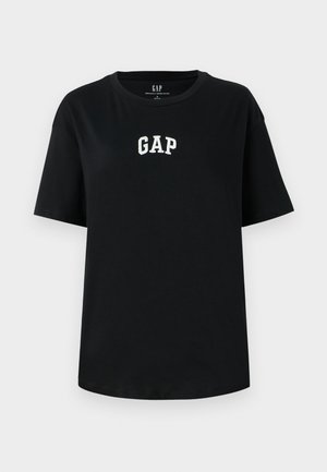 Crna pamučna majica kratkih rukava, sa bijelim izvezenim "GAP" logotipom sprijeda. Okrugli izrez i opušteni kroj.