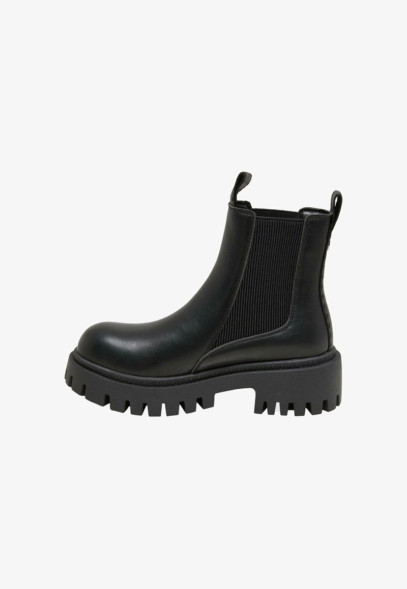 Botine negre din piele, cu panouri elastice pe laterale, talpă din cauciuc masivă și lesă pentru a fi ușor de încălțat. Prezintă un finisaj lucios și o textură nervurată.
