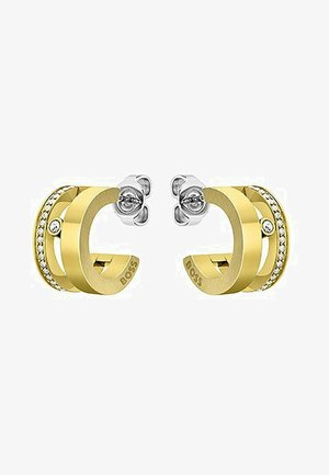 Los pendientes de aro en tono dorado presentan un diseño de doble banda con un acabado suave, acentuado por una fila de cristales transparentes y herrajes plateados.